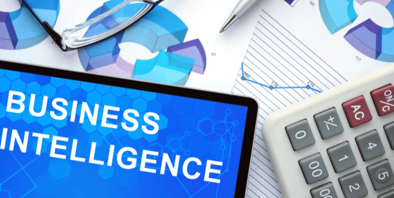 Image of the words business intelligence at a business persons desk